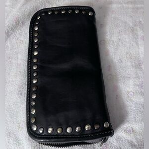 Women black wallet purchased in Italy